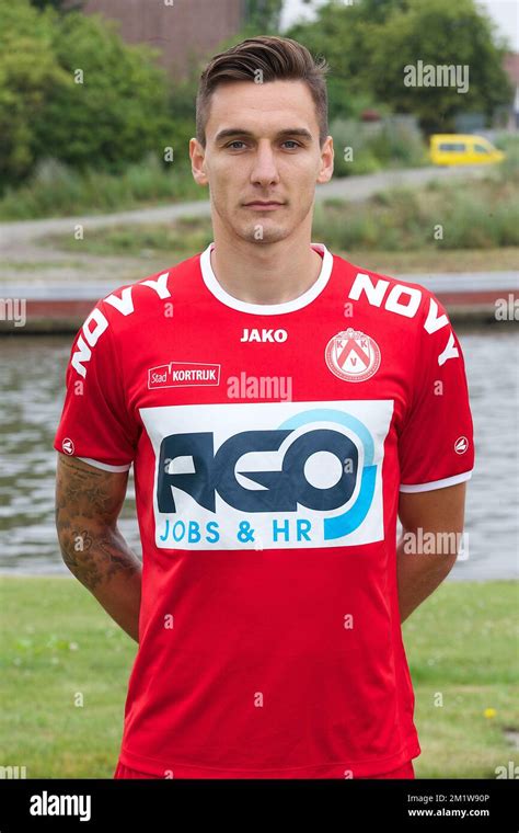 Kortrijk's Zarko Tomasevic poses for the photographer during the 2014 ...