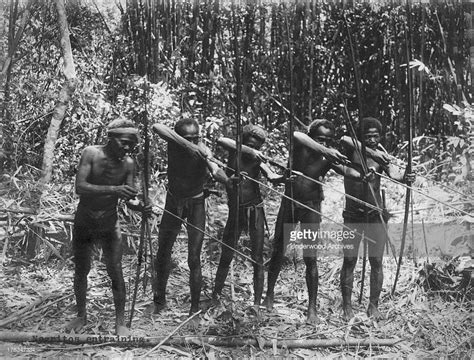 Skilled Male Members of the Negrito Tribe Demonstrating Hunting Abilities