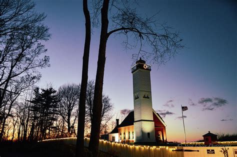 Presque Isle Lighthouse aka Flash Light Photograph by Sheila Saint - Pixels