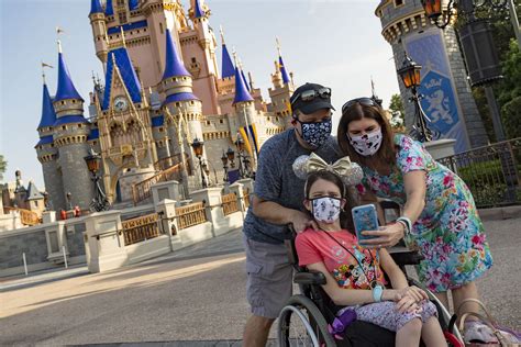 Family photos at Walt Disney World's Magic Kingdom