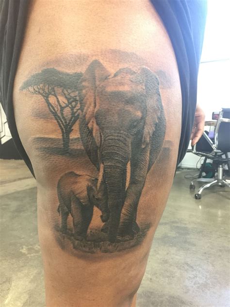 Elephant & baby thigh tattoo | Elephant tattoos, Baby elephant tattoo, Elephant tattoo design