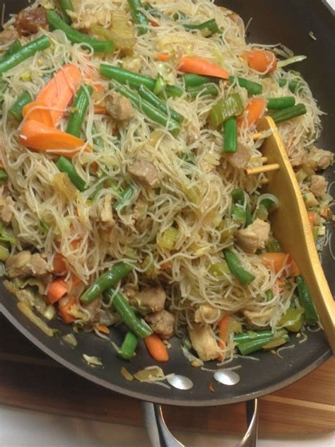 Pancit Bihon Guisado, Filipino Sauteed Noodles with Vegetables - Foodflag