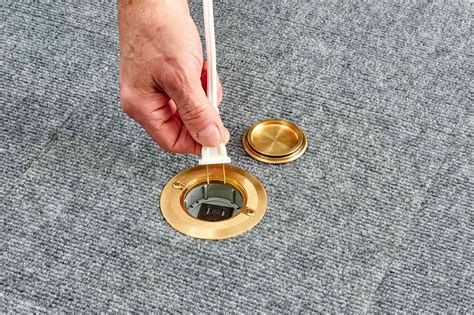 How to Install a Poke-Through Electrical Floor Outlet