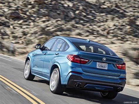 2016 BMW X4 M40i in Long Beach Blue Metallic Paint - Rear | Caricos