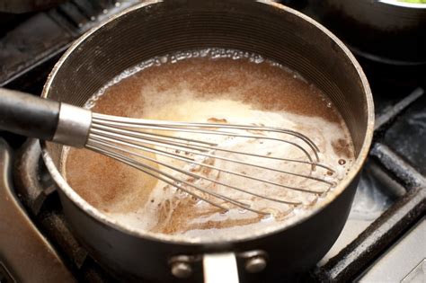 Gravy simmering in sauce pan - Free Stock Image