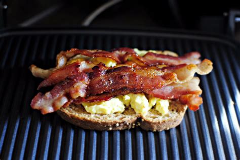 Simply Scratch bacon on eggs on bread - Simply Scratch