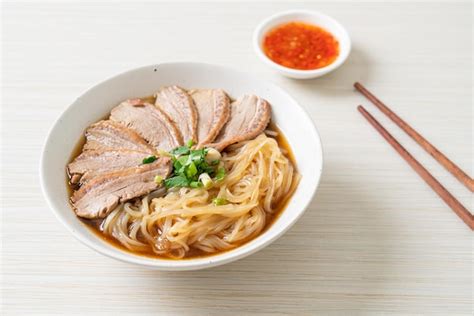 Premium Photo | Duck noodles with stewed duck soup