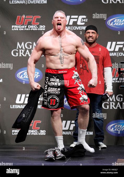 UFC fighter Brock Lesnar arrives at the weigh-ins for UFC 141 at the ...