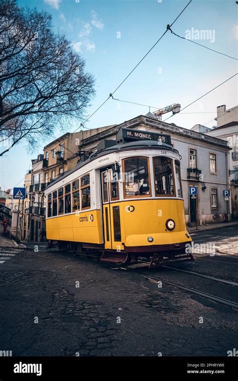 Old tram through the streets of beautiful Lisbon Stock Photo - Alamy