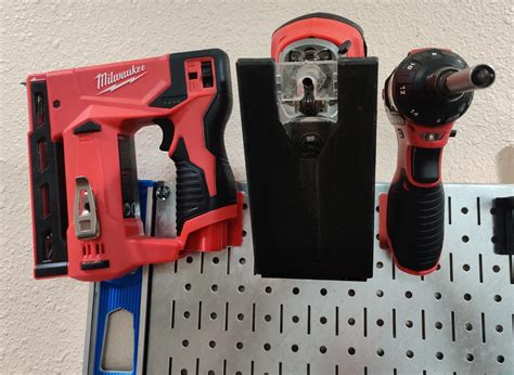 Milwaukee M12 tool holders for Wall Control Pegboard by Jav.BR | Download free STL model ...