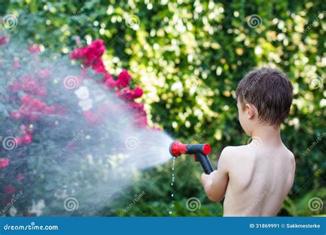 Little Boy Irrigate in Garden Stock Image - Image of heat, cute: 31869991