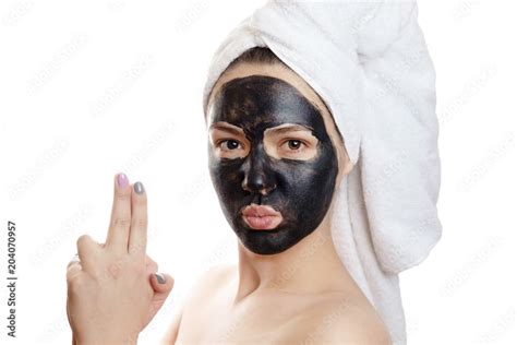 beautiful sexy girl with black face mask on the white background, close-up portrait, isolated ...