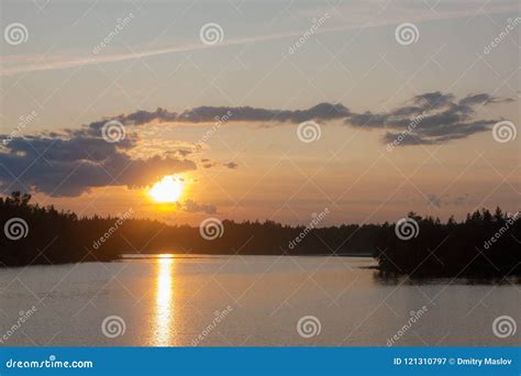 Sunset over a forest lake stock image. Image of dusk - 121310797