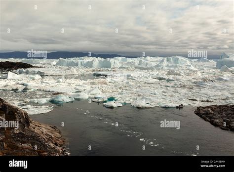 Greenland - a bay with icebergs during summer (Ilulissat Stock Photo ...