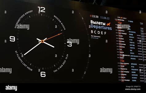 The big clock at Sheremetyevo airport. Arrivals Departures board Stock ...