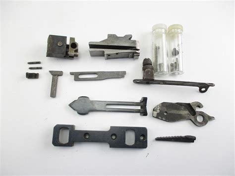 ASSORTED REMINGTON MODEL 12 PARTS