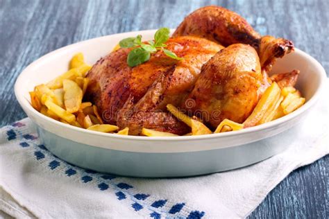 Roast Chicken and Potato Chips Stock Image - Image of baked, dinner: 62962537