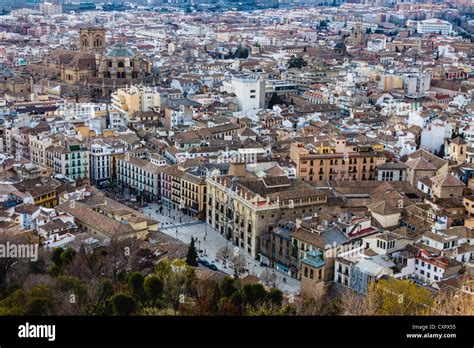 Aerial overview of Granada downtown with cathedral and Plaza Nueva square. Granada, Andalusia ...