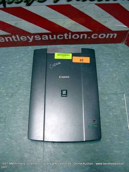 CANON LIDE 210 SCANNER - Bentley & Associates, LLC