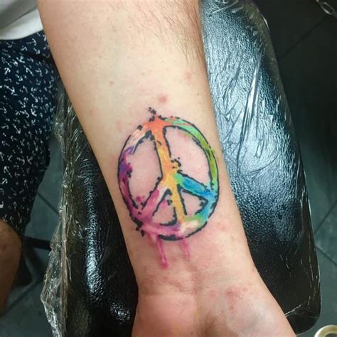 55+ Best Peace Sign Tattoo Designs - Anti-War Movement Symbol (2019)