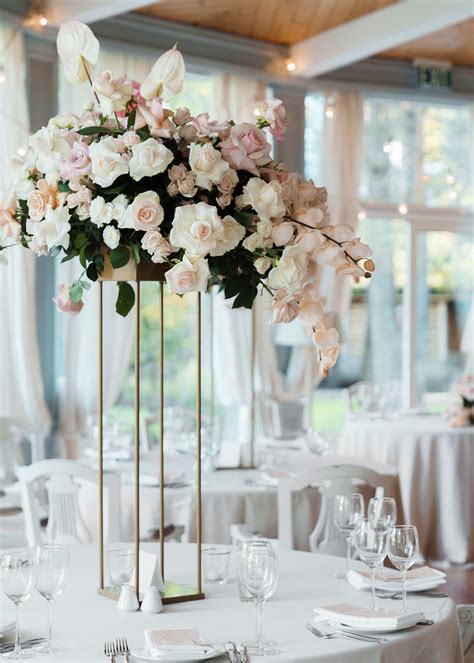 29 Tall Centerpieces That Will Take Your Reception Tables to New ...