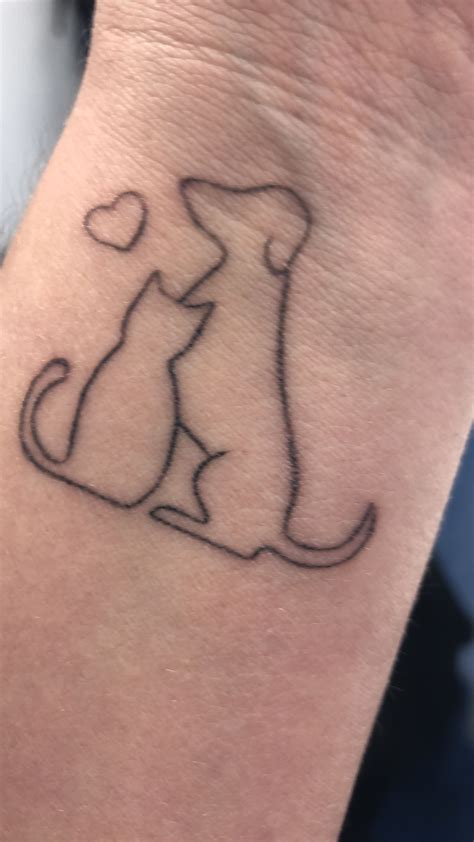 Cat and Dog Tattoo | Cat and dog tattoo, Trendy tattoos, Foot tattoos for women