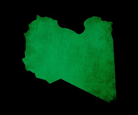 Map outline of Libya with flag grunge paper effect Photograph by Matthew Gibson