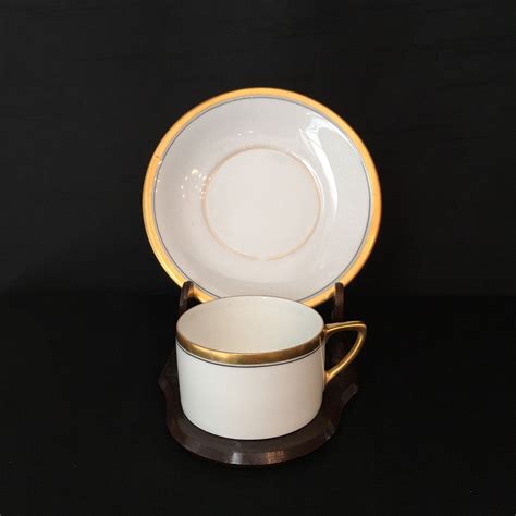 Porcelain demitasse cup and saucer with vintage stand. Check out my ...