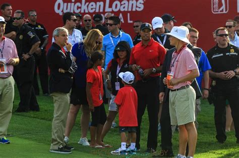 Tiger Woods attends the Quicken Loans National PGA Golf Tournament with ...