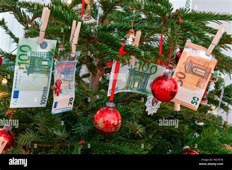 christmas tree, donation, gift of money Stock Photo - Alamy