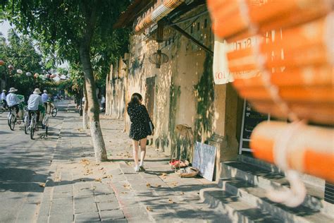 Woman Walking on Sidewalk · Free Stock Photo