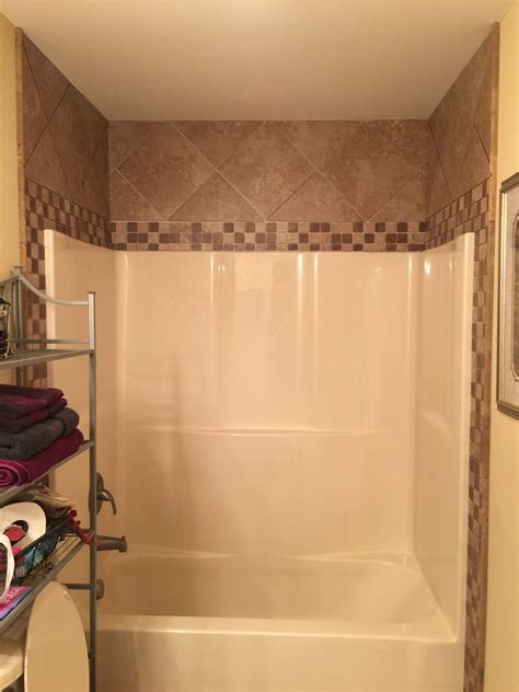 Tile around fiberglass shower/tub | Bathrooms remodel, Fiberglass shower, Tile around bathtub