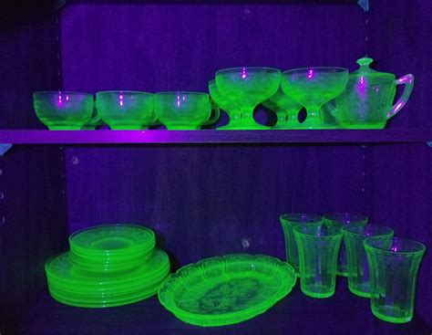 The set of uranium glass dinnerware I inherited. Unfortunately the 6th ...