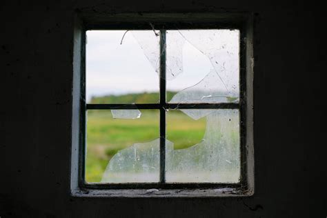 A Window With Broken Glass · Free Stock Photo