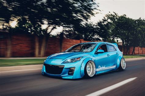 Extremely Exotic Clinched Body Kit on Blue Mazda 3 — CARiD.com Gallery