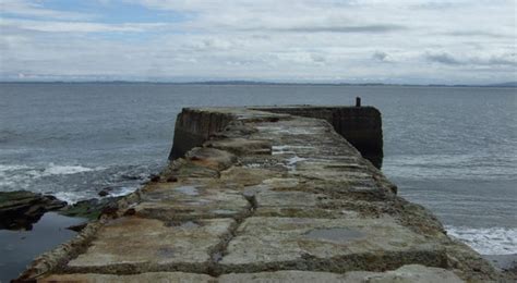 Wave Forces on Vertical Coastal Breakwaters