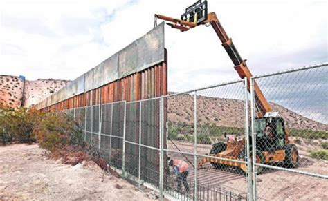 Eight prototypes of a proposed southern border wall under construction ...