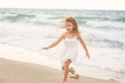 Little girl feet on beach — Stock Photo © tarafoto #57289567