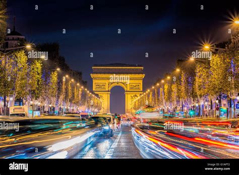 Avenue des Champs-Elysees with Christmas lighting leading up to the Arc de Triomphe in Paris ...