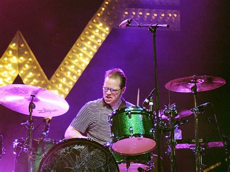 Weezer Drummer Patrick Wilson Catches Frisbee Mid-Song at Concert