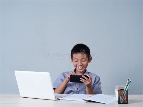 Little Boy with Laptop Studying Online Stock Photo - Image of vide ...