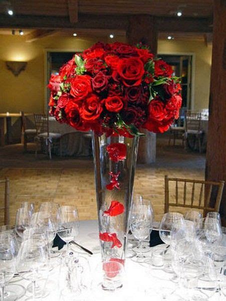 Suspended petals | Red roses centerpieces, Wedding centerpieces, Rose centerpieces