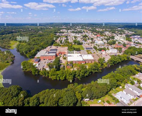 Cumberland historic town center aerial view on Broad Street with Blackstone River in town center ...