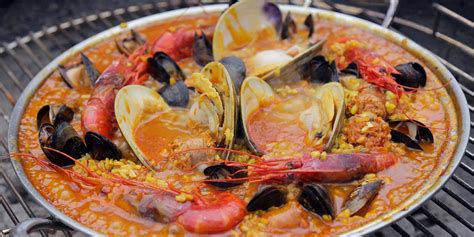 Grilled Paella with Shrimp, Mussels & Clams Recipe - Andrew Zimmern