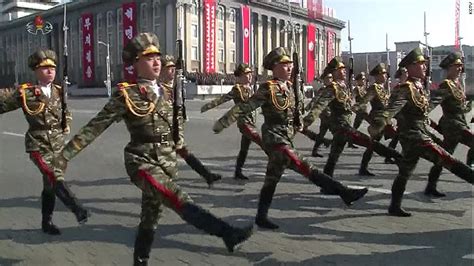 Kim Jong Un watches parade of North Korean tanks, missiles and troops - CNN