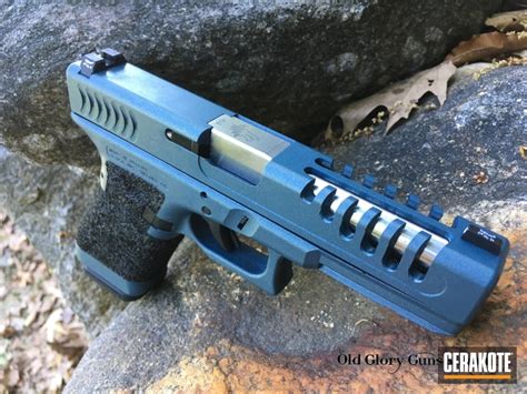 Custom Glock Handgun coated in Cerakote H-185 Blue Titanium by DANA RYLL | Cerakote