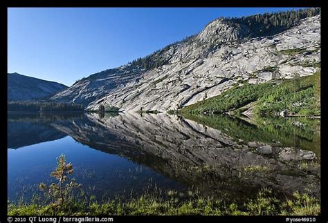 Picture/Photo: Peaks reflected in mirror-like waters, Merced Lake. Yosemite National Park