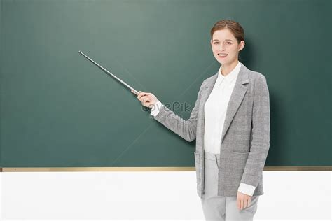 Image Of Young English Foreign Teacher Pointing At Blackboard Picture ...