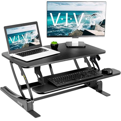 Height adjustable standing desk converter - sworldras