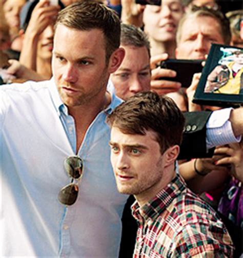 sir-radcakes, potterbird: Daniel Radcliffe and his bodyguard...